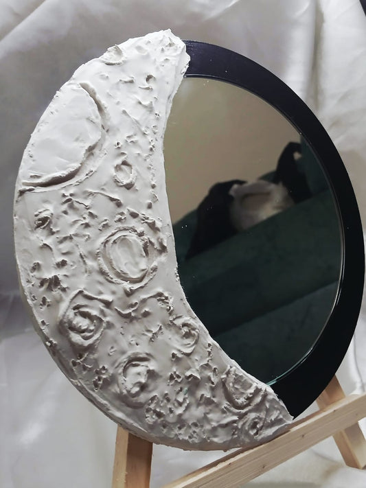 Crescent mirror