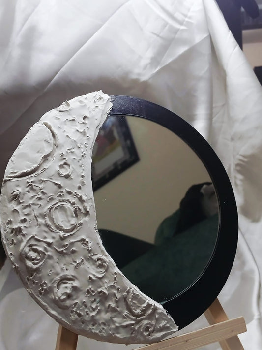 Crescent mirror